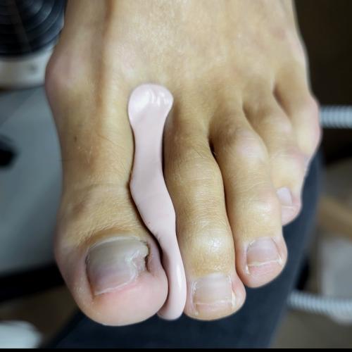 meziprstní korektor